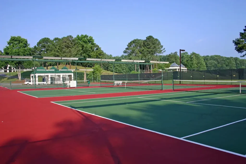Tennis surfaces with Nova Sports systems, designed for consistent ball bounce and high-performance play.